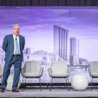 Paul Isely and Kuhelika De on stage at the 2023 Economic Forecast Event